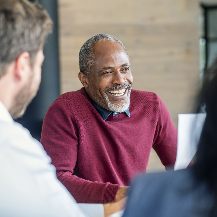 smiling man in office